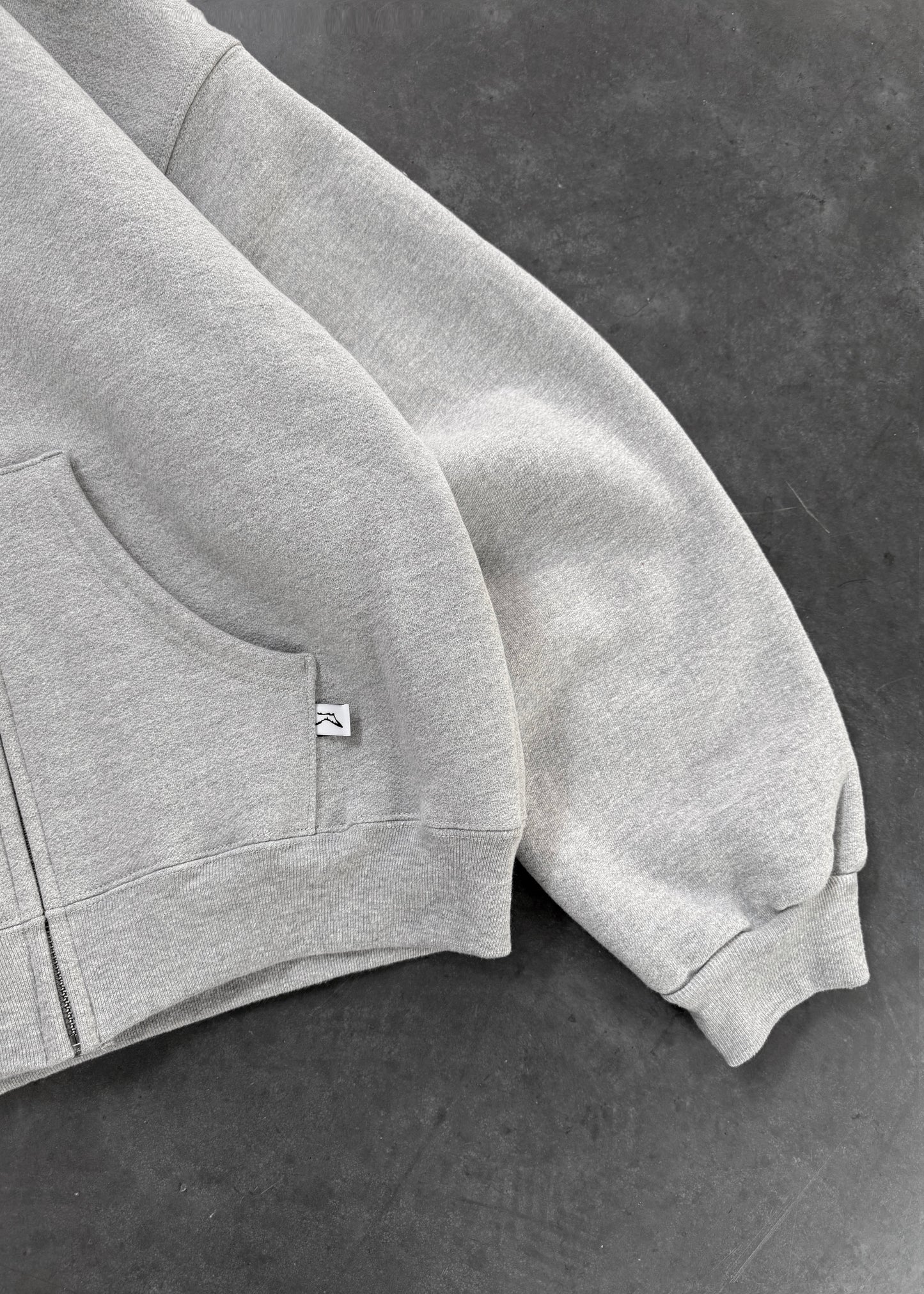 Felpa grigia con cerniera SWEATS®